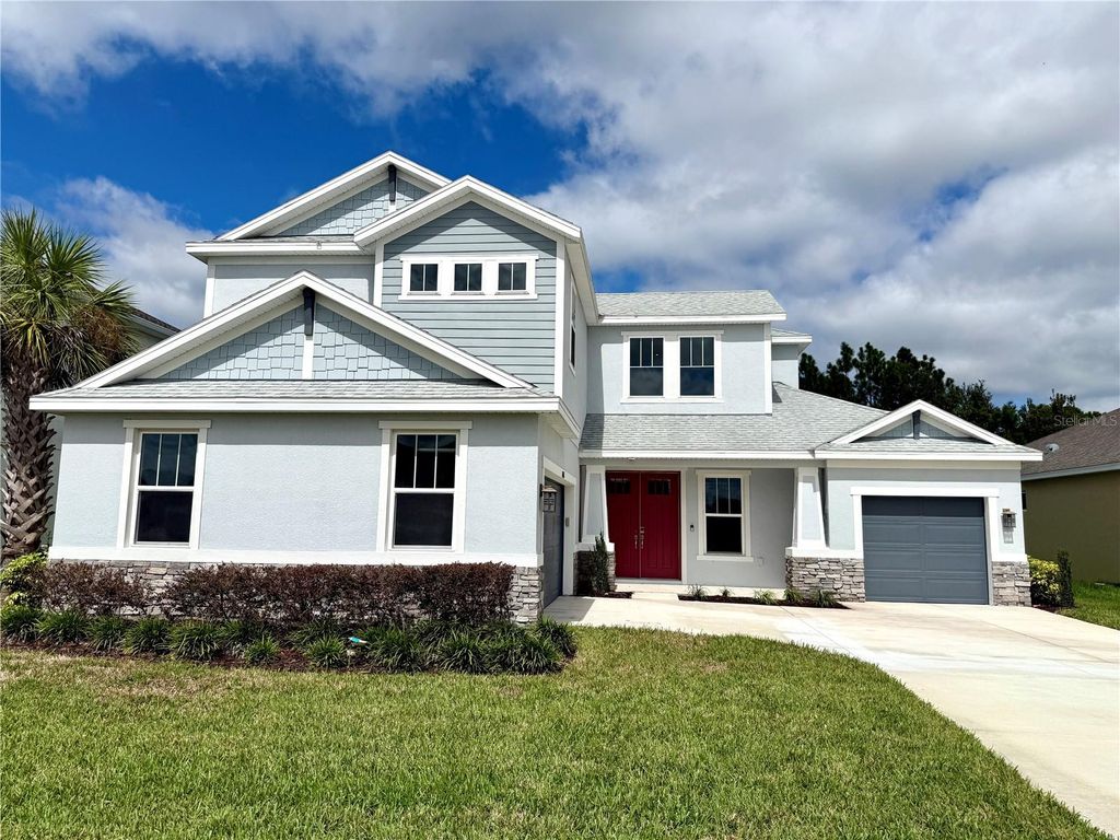 Photo of 33346 Castaway Loop, Wesley Chapel, FL 33543 (MLS # O6348692)