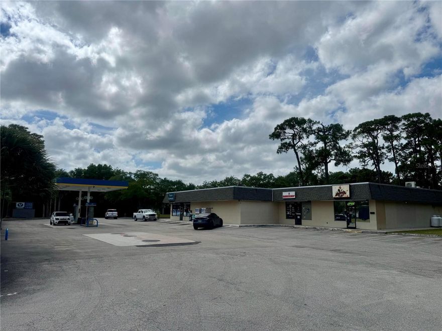Income-producing investment and real estate opportunity in St. Lucie County. Net ROI is estimated at 5.5. Property closely located to SW Port St. Lucie Blvd and SW Gatlin Blvd in densely populated residential area. Total county population more than 375,000 with continuing growth expected. 

This investment consists of a popular plaza with established tenants including a restaurant, convenience store/gas station (with additional lotto income), and a barbershop. The gas station consists of 4 gas tanks, 2 of which were upgraded in 2009. No current supply document. 

Real estate: finished (under air) 4,840 +/- SQFT, gross 6,204 +/- SQFT on 2.89 +/- acres of land.
