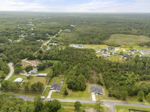Photo of 8017 Woodleaf Boulevard, Wesley Chapel, FL 33544 (MLS # R4911453)