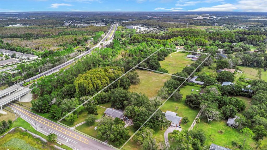 Photo of 17515 Lakeshore Road, Lutz, FL 33558 (MLS # TB8445007)