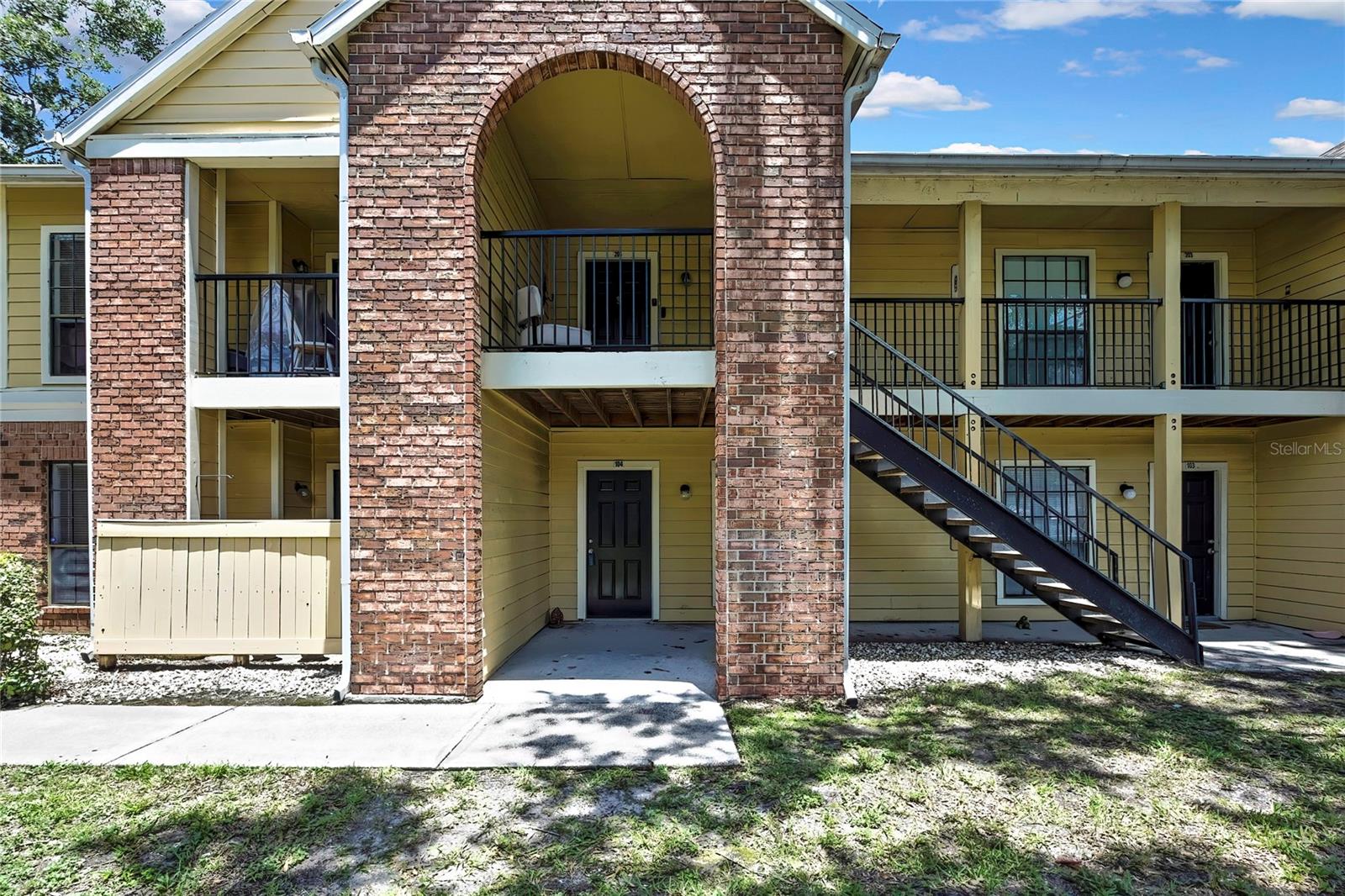 Beautifully updated and full of charm, this two-bedroom, two-bath condo in The Grand Reserve at Carrollwood offers a stylish sanctuary with the feel of a private resort. Located in the heart of Carrollwood, this GATED community provides residents with a luxurious, resort-style lifestyle and an unbeatable central location. Thoughtfully renovated from top to bottom, this ground-floor residence blends modern elegance with everyday comfort. From the moment you step inside, you'll appreciate the attention to detail—from the gleaming New luxury vinyl plank flooring that flows throughout to the sparkling Quartz countertops that elevate every space. The kitchen and bathrooms have been completely reimagined with all-New Shaker-style cabinets, offering clean lines and timeless appeal. The stylish kitchen is a true showpiece, featuring a glass tile backsplash, a suite of New appliances, and a hi-bar breakfast counter—perfect for meal prep, casual dining, or entertaining. The open-concept living area flows effortlessly to sliding glass doors that lead to a covered patio with a convenient storage closet, creating a relaxing retreat for your morning coffee or evening unwind. The split-bedroom layout provides added privacy, with the primary suite offering its own full bathroom and spacious walk-in closet. A second full bath and another generous walk-in closet serve the second bedroom, making this home as functional as it is beautiful. A laundry area behind bifold doors adds everyday convenience. The building has a New roof just 1.5 years old, and the unit includes assigned parking. The Grand Reserve offers access to exceptional amenities including a sparkling resort-style swimming pool with an expansive sundeck and cabanas, a rejuvenating spa, a state-of-the-art fitness center, and a beautifully appointed clubhouse. Enjoy lighted tennis courts, a basketball court, sand volleyball, a playground, gazebo, barbecue areas, scenic walking trails, a dog park, a car care center, and optional storage units—everything you need for an active and carefree lifestyle. Ideally situated just minutes from Tampa’s top destinations—Busch Gardens, Raymond James Stadium, the University of South Florida, and Downtown Tampa—this home also offers easy access to Dale Mabry Highway, Veterans Expressway, I-275, and Tampa International Airport. With its prime location, upscale amenities, and beautifully upgraded interior, this condo truly offers the perfect blend of comfort, style, and convenience. Schedule your private showing today!
