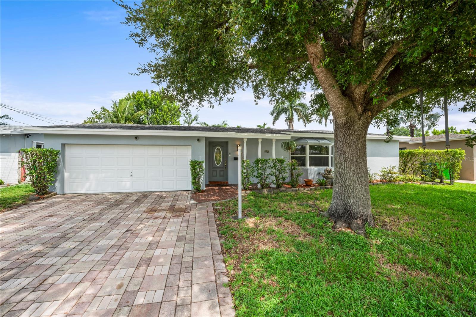 Welcome to your S Florida OASIS Conveniently located in the well established community of Sunrise. Close to shopping, golf, eateries, and a short drive to Florida's east coast or Florida's Everglades, this home is located in a prime location for enjoyment of all things Florida! Steps away from Horizon Elementary, Bair Middle School, and Plantation High School, this well-maintained 4 bedroom 2 bath pool home awaits! Situated on a spacious lot overlooking one of Sunrise's canals, this property offers so much. Upon arrival you will note the expansive driveway and mature tropical landscaping. Entering the home, the generous living space flows into the updated kitchen, where you will note stainless appliances, and views overlooking the pool. There's a pool bath for wet feet right off the pool deck! Other features include split floor plan, impact windows, NO HOA. Roof placed in 2021. HVAC 2018 with new insulation added 2025. Electrical Panel updated 2018. Water Heater 2019. Washer and gas Dryer convey. MAKE AN APPOINTMENT TODAY!