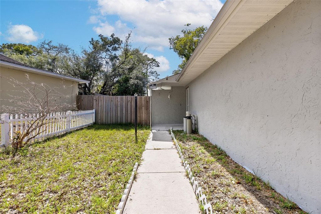 Photo of 4420 Sugar Loaf Way, Orlando, FL 32808 (MLS # O6403573)