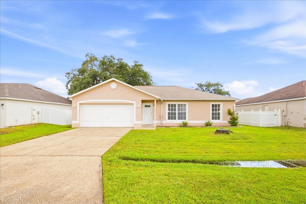 Photo of 718 Pincon Lane, Kissimmee, FL 34759 (MLS # S5160541)