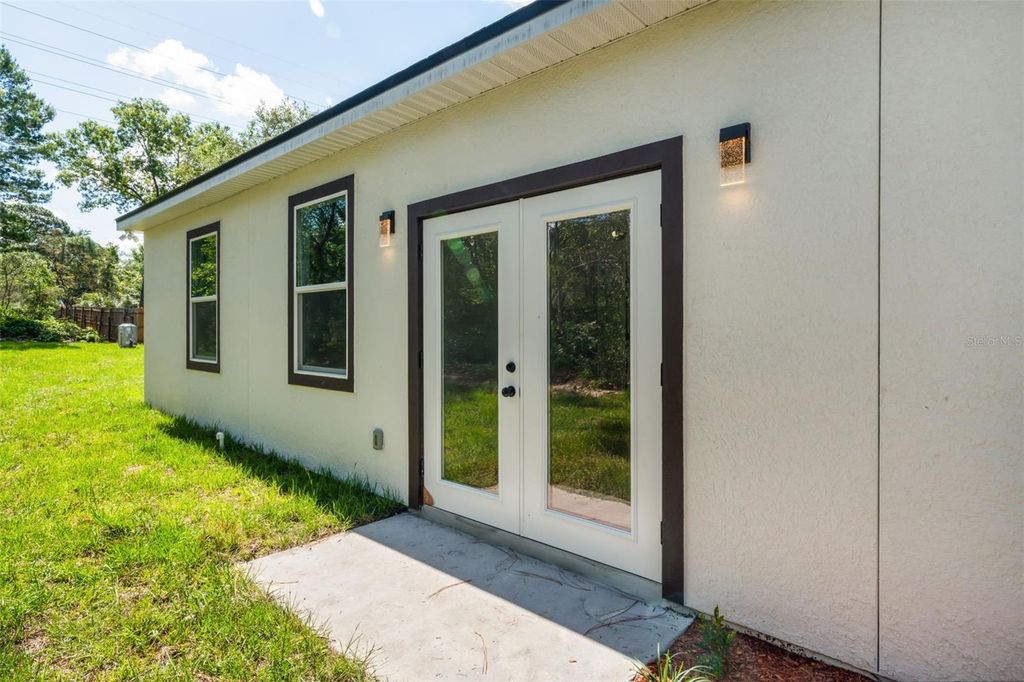 Photo of 149 Hickory Avenue, Orange City, FL 32763 (MLS # O6409740)