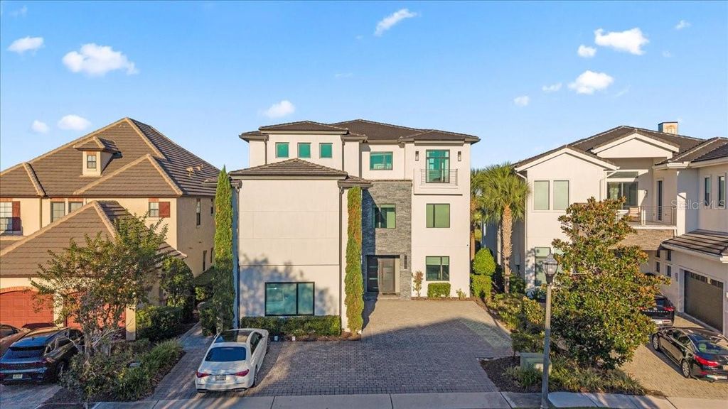 Photo of 331 Muirfield Loop, Reunion, FL 34747 (MLS # S5138640)