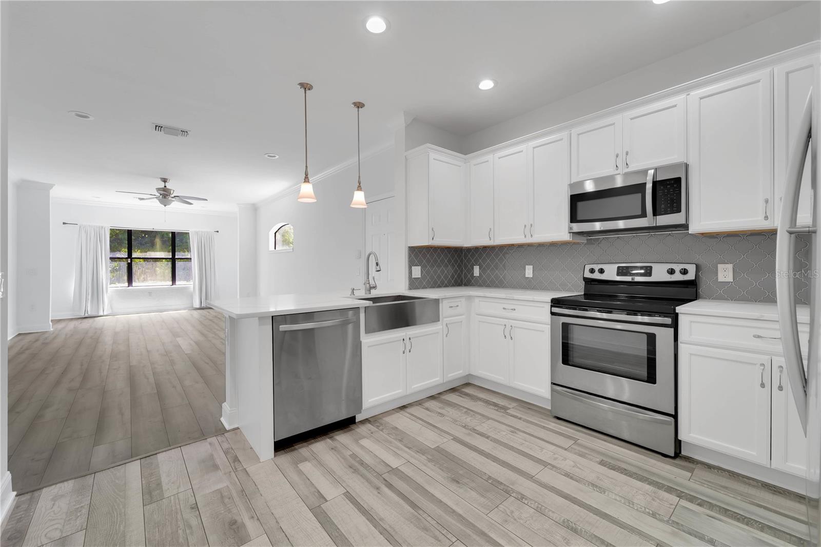 Fully renovated 2 Bedroom, 2.5 Bath townhouse, thoughtfully converted to feature two master suites—perfect for privacy and or guests. One of the few homes in the community offering serene water views of the little lake, this property is one of a kind!
Inside, you will get to enjoy brand new quartz countertops, stainless steel appliances, a farmhouse sink, and designer pendant lighting that elevates the chef’s kitchen. The spacious layout flows seamlessly into the living and dining spaces, while the oversized one-car garage offers rare extra storage and convenience.
But the best part of all is the resort-style amenities. Indulge in not one, but two heated pools, pickleball & tennis courts, an amazing clubhouse, an updated fitness center, basketball courts, playground, movie theatre, and even car wash bays right in the community.
All this in a prime location—minutes to the Pinellas Trail, world-class beaches, major airports, and perfectly timed for the 2026 Valspar Golf Championship! Don’t miss the chance to own one of the most updated and unique homes in this sought-after community with some of the best features around!