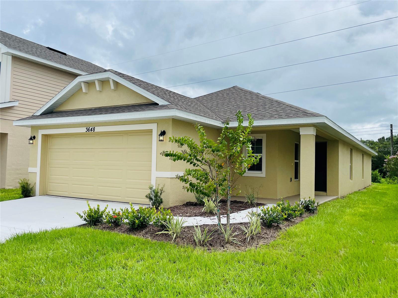 Under contract-accepting backup offers. Brand New move-in ready Home 4 bedrooms and 2 bathrooms.**Brand New move-in ready Home 3 bedrooms and 2 baths. This home is perfect for entertaining with its open floor plan. The upgraded kitchen features granite thru out the large island and counter tops. This kitchen has beautiful Whirlpool stainless steel appliances. You'll also love the spacious laundry room. The bathrooms are spacious and elegant with beautiful granite. Rest easy knowing your new home comes with a 1-year builder warranty and a 10-year structural warranty. Located near Harmony Main where you can enjoy the great amenities such as 12.5 miles of Trails and pathways, go and play at the stunning golf course Harmony Golf Preserve and even become a member of the community garden program. Harmony Central provides an everyday escape from ordinary living, this location offers both convenience and leisure. This is the last Harmony Community with No CDD and a very low HOA that will feature a beautiful community pool with cabanas.