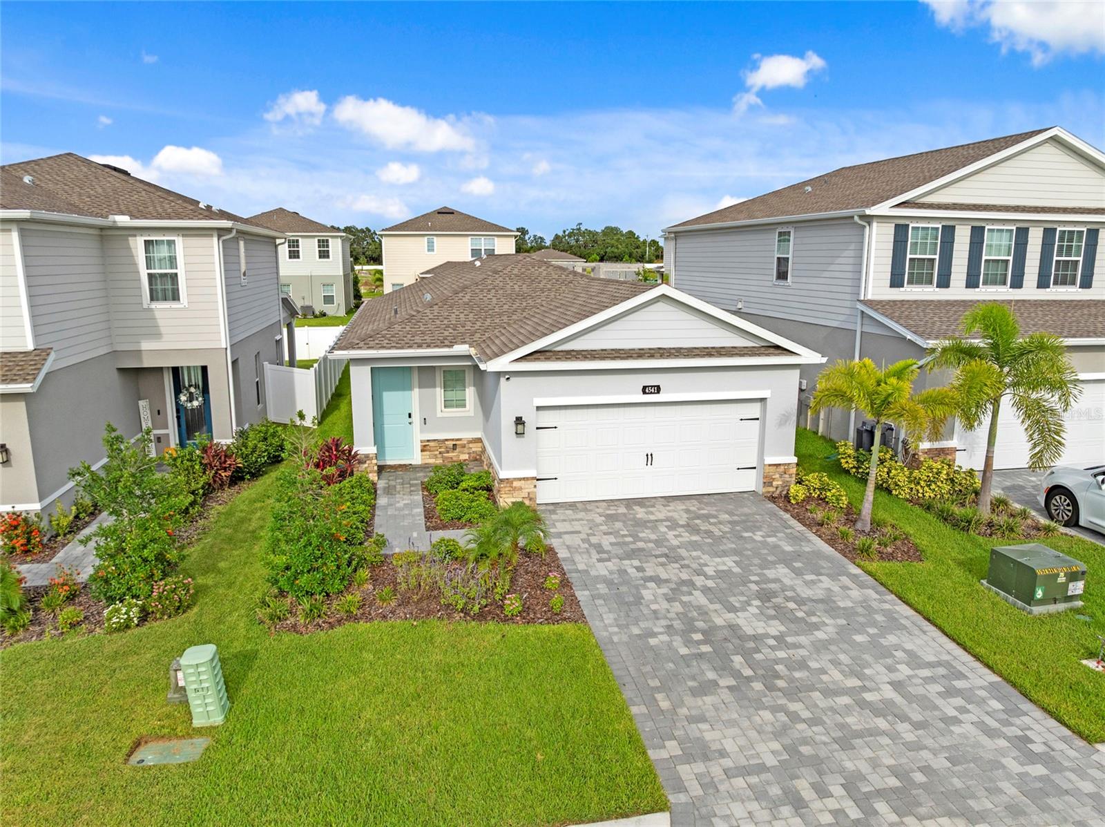One or more photo(s) has been virtually staged. Welcome to Avalon Woods, where luxury and comfort intertwine just moments from everything you adore about Lakewood Ranch! This stunning split-bedroom, open-concept home is an entertainer's dream and the perfect backdrop for cherished family moments. Step into the heart of the home—a beautifully designed kitchen that seamlessly connects the dining area and living room. With a generous island, abundant cabinet space, and a convenient walk-in pantry, this kitchen caters to your culinary desires. The exquisite granite countertops, sleek glass tile backsplash, and modern stainless steel appliances elevate the home's luxurious ambiance. As you enter the expansive living area, you’ll be drawn to the large backyard, which offers endless possibilities for outdoor enjoyment. It's mostly fenced, requiring just a couple of gates to become a complete oasis. Retreat to the spacious primary bedroom at the back, featuring a sizable walk-in closet and a serene ensuite bathroom with a stylish ceramic tiled walk-in shower, double-sink vanity, and large linen closet. The two additional bedrooms at the front of the home provide privacy, while the well-appointed secondary bathroom includes a tub-shower combo with elegant ceramic tile surround. Convenience meets functionality with a generously sized laundry room right by the front door. Embrace the Florida lifestyle you've always dreamed of without sacrificing space or location. Designed for modern living, this home is packed with desirable upgrades, including many that are no longer offered by the builder. Avalon Woods Community includes amenities such as a dog park, playground, walking trail, and lush green spaces meticulously planned for enhanced outdoor enjoyment. Is this your ideal home? Don't wait—book your showing today and see for yourself the perfect blend of luxury, comfort, and community!