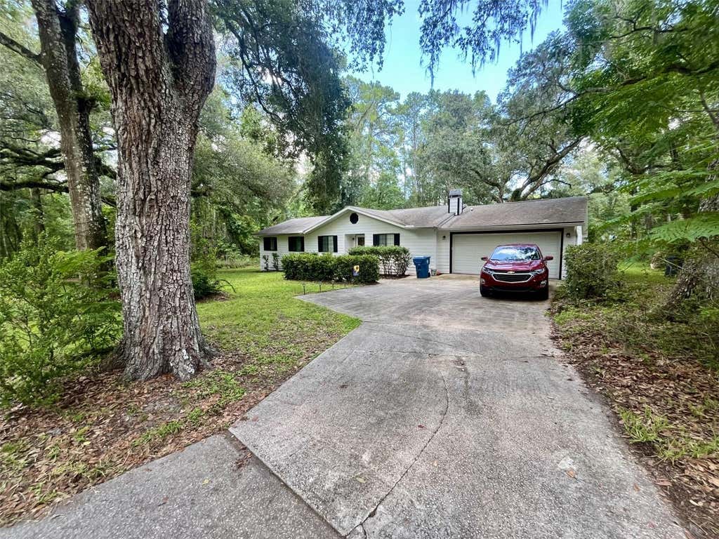 Photo of 5020 Cedar Lane, Brooksville, FL 34601 (MLS # TB8525328)