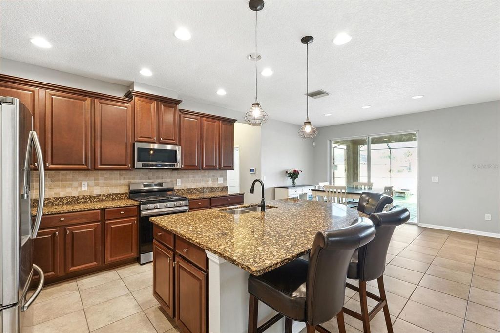 Photo of 11206 Coventry Grove Circle, Lithia, FL 33547 (MLS # TB8414654)