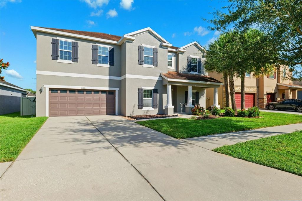 Photo of 11206 Coventry Grove Circle, Lithia, FL 33547 (MLS # TB8414654)