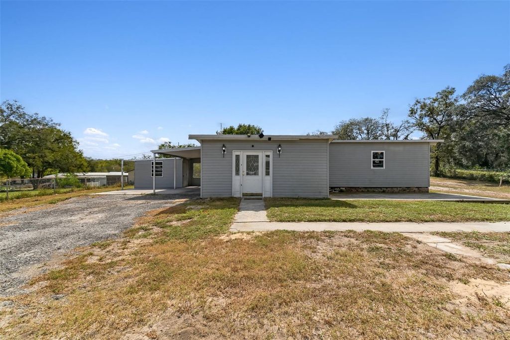 Photo of 9617 Silverbend Drive, Dade City, FL 33525 (MLS # TB8380925)
