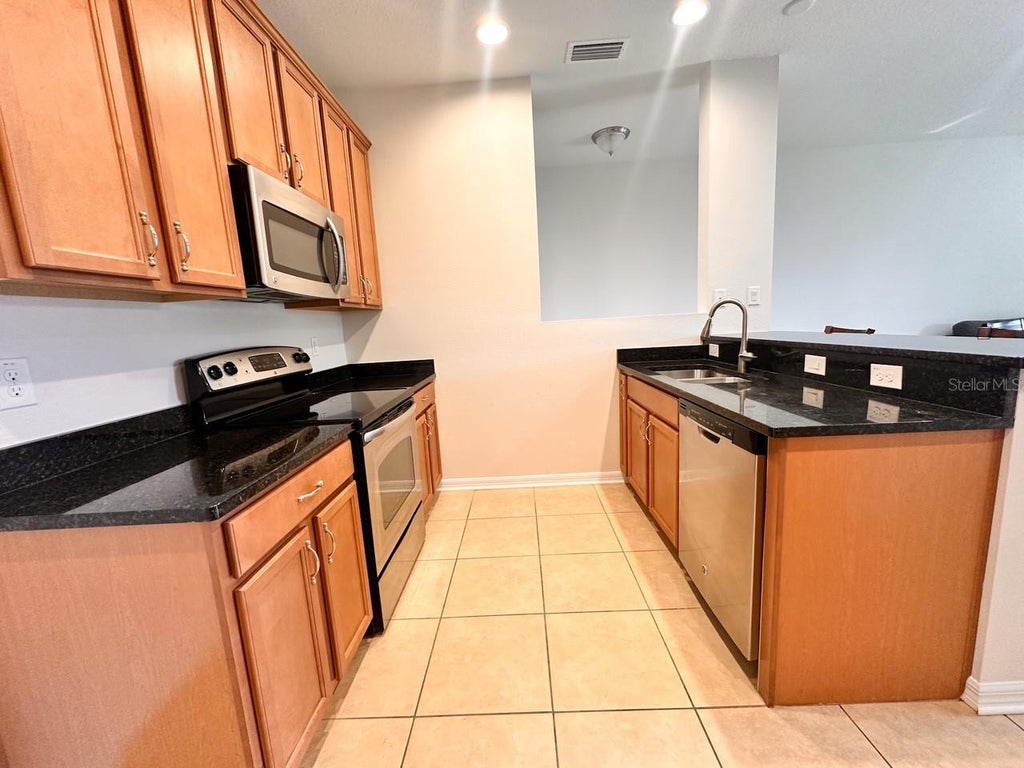 Photo of 11511 84th Street Circle E #105, Parrish, FL 34219 (MLS # A4701371)