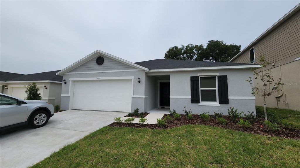 Photo of 9938 Mesic Woods Avenue, Seffner, FL 33584 (MLS # TB8519294)