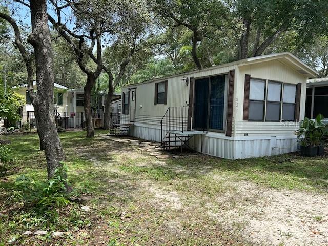 Welcome to your home in a gated community in Apopka where you own the land! Turnkey investment property. This one bedroom/one bath home has been completely remodeled this year and a new roof in 2024. Community is gates with a pool, basketball courts, and its own convenience store. Just over 400 sq ft; however, you'll be surprised how much larger it feels! AC is a split system, stove is gas; however hot water heater is electric and you're on city water! Short-term rentals are allowed, as well as available for Airbnb and VRBO. Currently renting with lease until January 1, 2026 - rents for $1,100 monthly. It's close to Maitland Blvd, 429, downtown Orlando and less than 30 minutes to the attractions. Schedule your showing today!