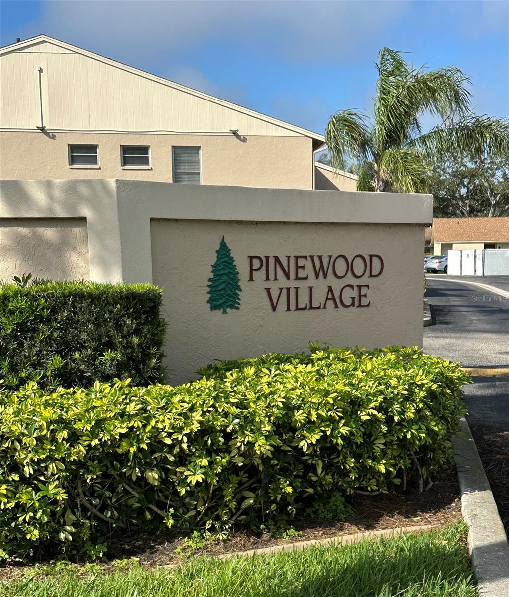 Charming Coastal Condo in Sarasota FL has great floor plan and an attractive price. This two-bedroom, two-bathroom condo offers the perfect blend of coastal charm and convenience in a quiet and well-maintained community. Added features are an oversized laundry room, a carport for covered parking and an ideal location. This is effortless living meeting unbeatable convenience! Once you step through the front door, you'll discover an airy open floor plan filled with natural light, new flooring, and freshly painted... the perfect environment for both relaxation and entertaining. Whether looking for your new permanent FL home, a winter retreat or investment property, its all about location, location, location! This residence is perfectly situated near Sarasota's world-class beaches, premier shopping, Sarasota-Bradenton Airport, and top-rated medical facilities. Just a short drive to all the wonderful Sarasota amenities such as (but not limited to) Lido Key, Siesta Key Beach, golf courses, vibrant downtown dining and cultural attractions. This home truly has it all. In addition, I'd be amiss not to mention the Pinewood Village community amenities where you can meet and greet friends around the pool, clubhouse, exercise room or for a game of shuffleboard. Without a doubt, this home checks all the boxes!