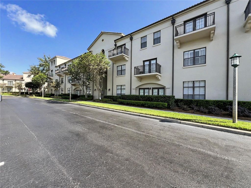 Photo of 909 Waterside Lane #206, Celebration, FL 34747 (MLS # O6404835)