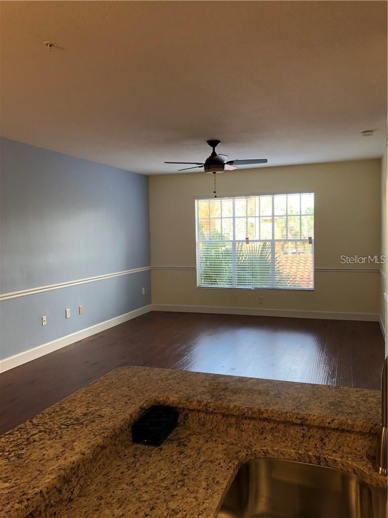 Photo of 5536 Metrowest Boulevard #8-202, Orlando, FL 32811 (MLS # O6449987)
