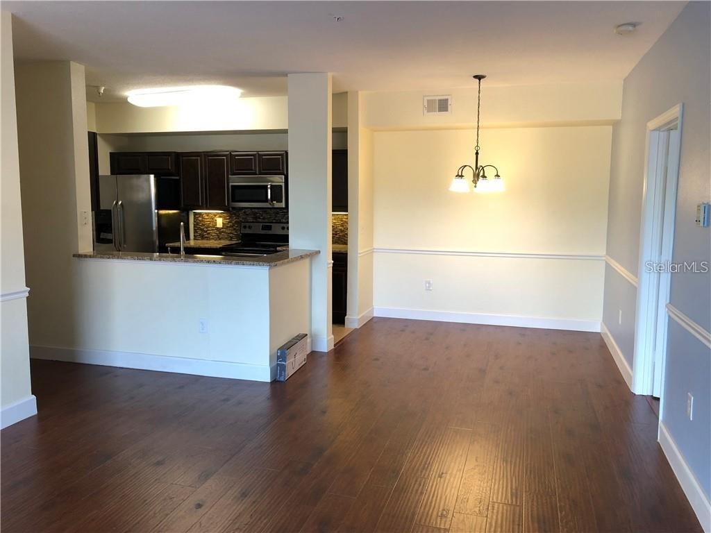 Photo of 5536 Metrowest Boulevard #8-202, Orlando, FL 32811 (MLS # O6449987)