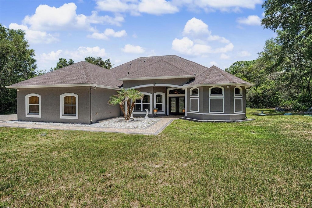 Photo of 10933 Pinto Drive, Hudson, FL 34669 (MLS # TB8511267)