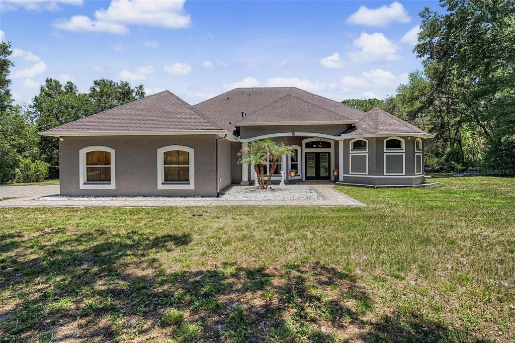 Photo of 10933 Pinto Drive, Hudson, FL 34669 (MLS # TB8511267)