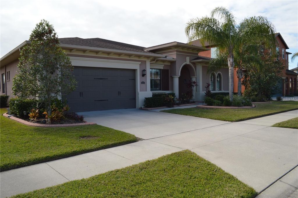 Photo of 32026 Wenlock Loop, Wesley Chapel, FL 33543 (MLS # O6334448)