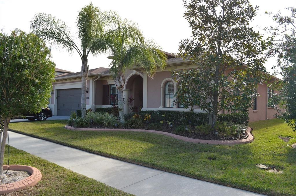 Photo of 32026 Wenlock Loop, Wesley Chapel, FL 33543 (MLS # O6334448)