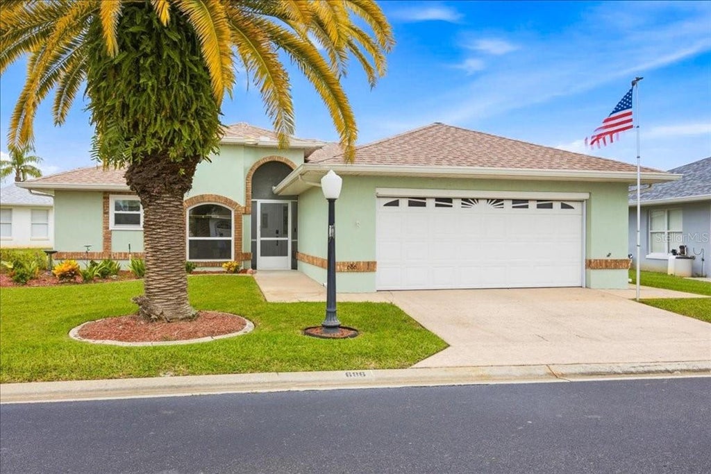 Photo of 686 Paradise Point, Haines City, FL 33844 (MLS # O6450620)