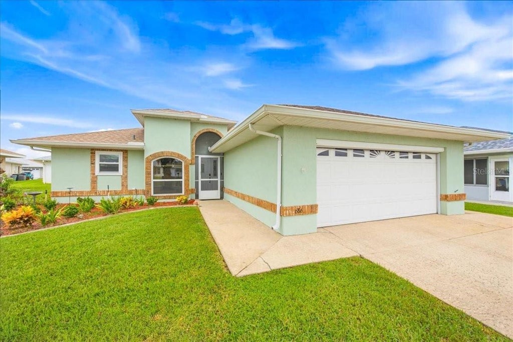 Photo of 686 Paradise Point, Haines City, FL 33844 (MLS # O6450620)