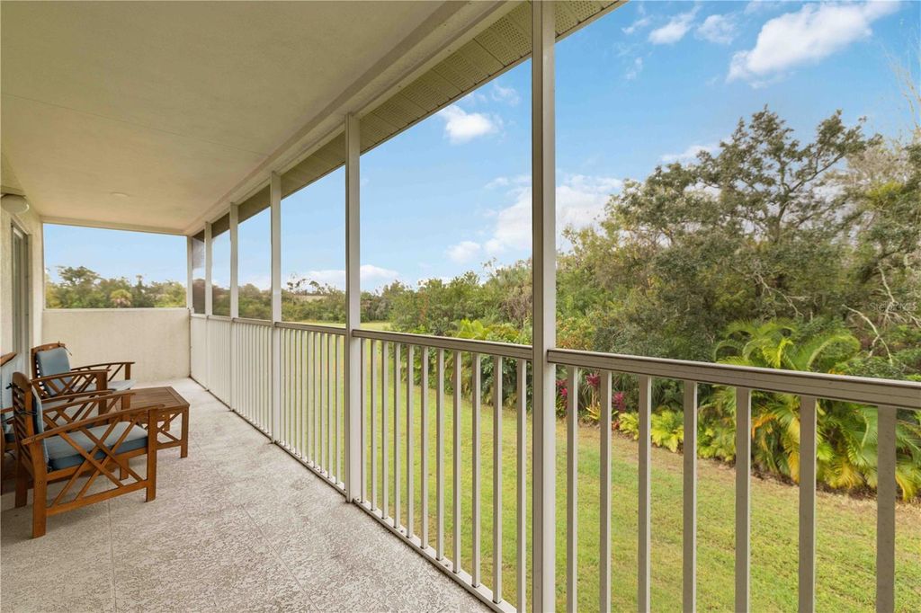 Photo of 7532 Marsh Orchid Circle #8-201, Bradenton, FL 34203 (MLS # A4678503)