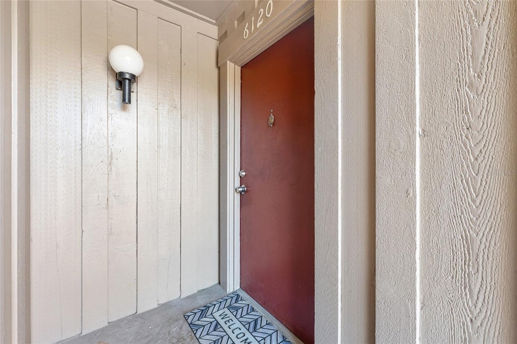Photo of 6120 Peregrine Avenue #A08-2, Orlando, FL 32819 (MLS # O6424344)