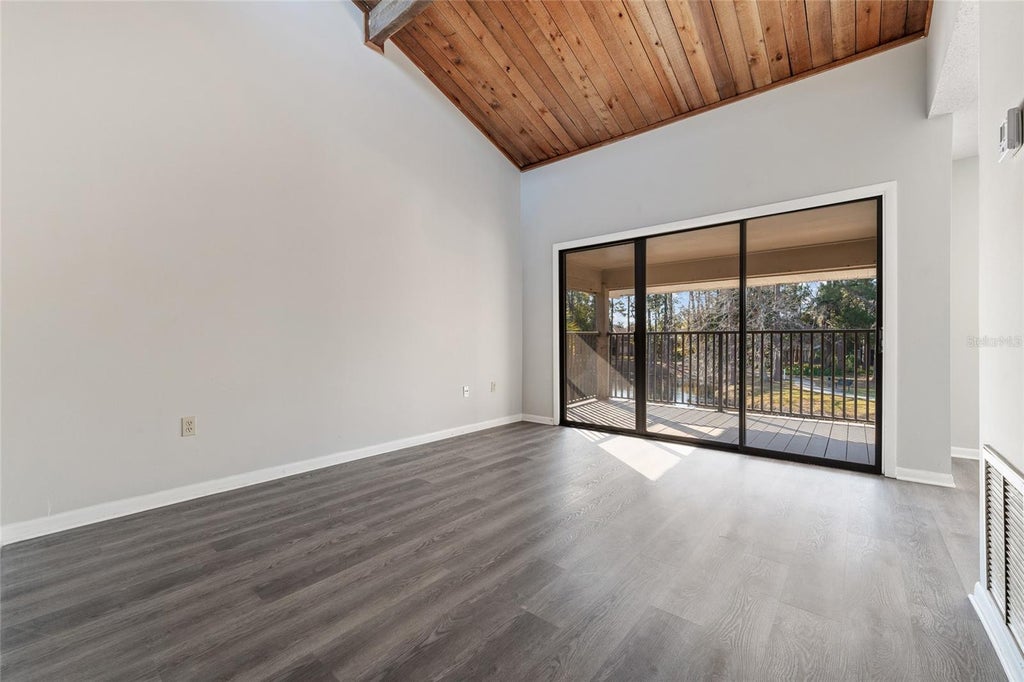 Photo of 6120 Peregrine Avenue #A08-2, Orlando, FL 32819 (MLS # O6424344)