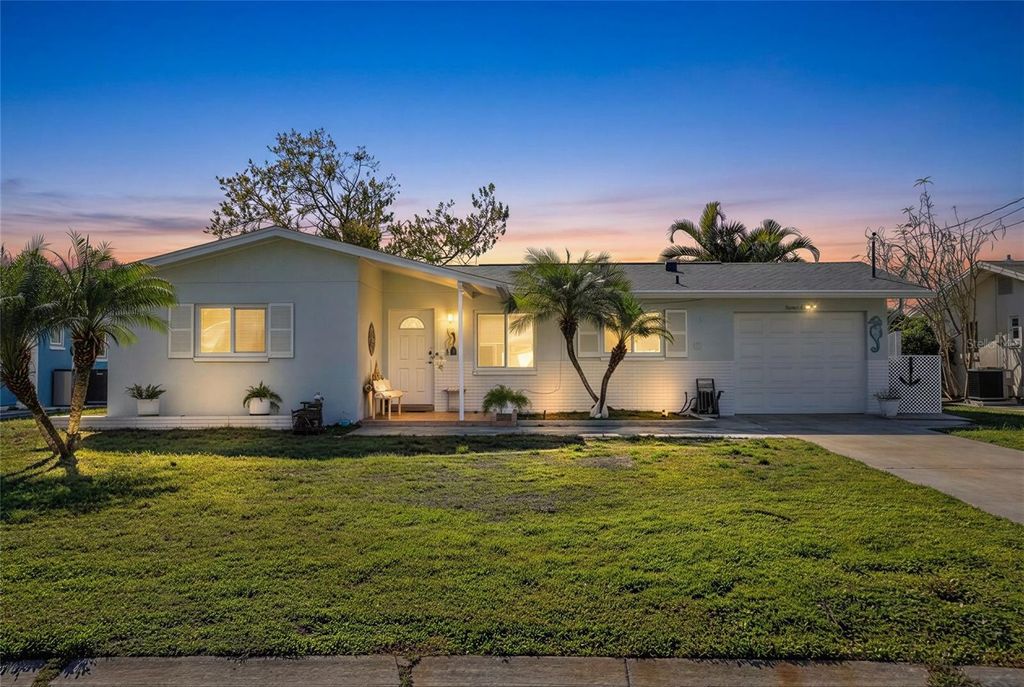 Photo of 1218 Lazy Lake Road E, Dunedin, FL 34698 (MLS # TB8498183)