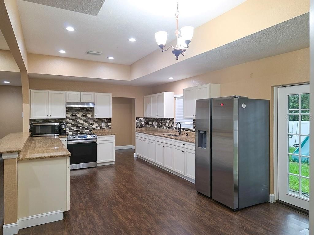 Photo of 1857 N Homeric Road, Avon Park, FL 33825 (MLS # L4953999)