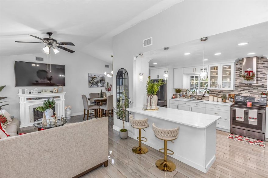 Welcome to this fully renovated, move-in-ready residence in the heart of Deltona, offering modern finishes, generous space, and effortless flow. This beautifully updated home features a stunning brand-new kitchen complete with elegant marble countertops, stainless steel appliances, and an open-concept layout that seamlessly connects the main living areas — perfect for both everyday living and entertaining. A separate formal dining space provides an inviting setting for gatherings and special occasions.

Luxury polished ceramic tile flooring runs throughout the home, enhancing its clean, contemporary aesthetic while offering durability and easy maintenance. The interior has been meticulously maintained and thoughtfully updated, creating a bright, welcoming atmosphere that feels both stylish and comfortable.

The exterior offers exceptional curb appeal with a spacious circular driveway, expansive front yard, and a two-car garage providing ample parking and storage. The oversized screened-in rear porch creates the perfect indoor-outdoor living space — ideal for relaxing evenings, hosting guests, or enjoying Florida’s year-round sunshine in comfort and privacy.

Ideally located with convenient access to major roadways, shopping, dining, parks, and everyday essentials, this home offers the perfect balance of tranquility and accessibility. Enjoy proximity to Orlando for work and entertainment, while still being within comfortable reach of Daytona Beach and Florida’s beautiful east coast attractions. Whether you’re looking for space, upgrades, or location, this property delivers exceptional value in a growing and desirable community.