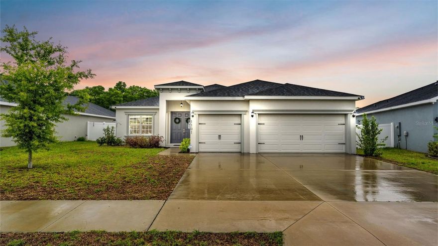 Welcome to your nearly-new dream home in the heart of Polk City! Built in 2023, this beautifully designed 4-bedroom, 3-bathroom residence with a dedicated office offers the perfect blend of modern comfort, functionality, and location.

Spanning 2,283 square feet, the open-concept layout features spacious living areas filled with natural light, ideal for both everyday living and entertaining. The chef-inspired kitchen flows seamlessly into the main living and dining spaces, creating a warm and inviting atmosphere for family and guests alike. The private office provides the perfect work-from-home setup or flex space to suit your needs.

Retreat to the generously sized primary suite, complete with a luxurious en-suite bathroom and ample closet space. Three additional bedrooms and two full bathrooms ensure plenty of room for family and visitors.

Step outside to enjoy a fully fenced backyard—perfect for pets, play, or relaxing evenings outdoors. The 3-car garage offers abundant storage and convenience.

Ideally located just minutes from Interstate 4 and the Polk Parkway, commuting to Tampa or Orlando is a breeze. Outdoor enthusiasts will love being right next to the TECO Auburndale Trail, offering miles of scenic biking and walking paths.

This move-in-ready home combines modern construction, thoughtful design, and an unbeatable location—don’t miss your opportunity to make it yours!