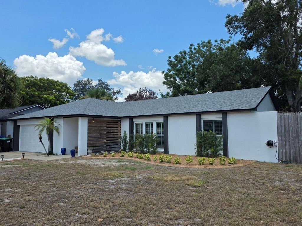Photo of 7005 Talbot Dr, Orlando, FL 32819 (MLS # O6428355)