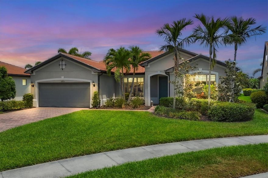 Great Buy Alert!!  3 CAR GARAGE, FRESHLY PAINTED EXTERIOR, No Stairs to walk up, Lots of Upgrades and situated on a PRIME WATERFRONT LOT.  Welcome home to 5923 Snowy Egret Dr, located in the highly sought-after gated community of Sandhill Preserve on Palmer Ranch. This stunning maintenance-free home sits on one of the premier lakefront lots in the neighborhood, offering expansive water views and desirable Northeast exposure. With nearly 2,800 sq. ft. of well-designed living space, this split floor plan offers both privacy and functionality. Inside, you’ll find an abundance of upgrades including elegant crown molding, neutral tile, and hardwood flooring throughout. The chef’s kitchen is a showstopper, featuring custom shaker cabinetry, granite countertops, stainless steel appliances, and ample storage space.
The spacious great room and dining area flow seamlessly for easy entertaining, while the screened and pavered lanai provides a peaceful retreat to enjoy the serene lake views. The three-car garage comes finished with durable epoxy flooring, perfect for additional storage or hobbies. Sandhill Preserve is known for its exceptional resort-style amenities. Residents enjoy a beautiful clubhouse, state-of-the-art fitness center, resort-style pool, tennis and pickleball courts, fire pit lounge, and a lively calendar of social events. The community is also guard-gated for added peace of mind and safety.  This home is ideally situated just minutes from a brand-new Publix and Costco, the world-famous beaches of Siesta Key, and vibrant downtown Sarasota, this home truly offers the best of Florida living. The remaining furnishings in the home are included if the buyer wants them.