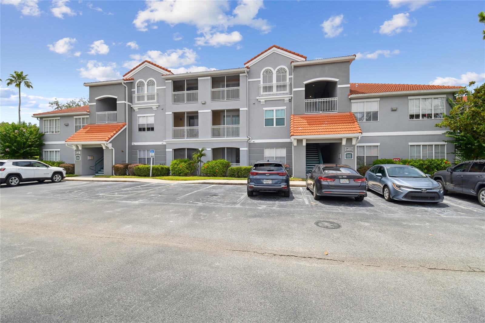Charming Move-In Ready 1 Bed/1 Bath Condo in Enclave at Richmond Place! Welcome home to this charming first-floor condo in the highly sought-after gated community of Richmond Place in New Tampa. This 1-bedroom, 1-bathroom unit is move-in ready! Step inside to a freshly painted interior, featuring luxury vinyl plank flooring and tile in the foyer, kitchen, and bath (NO CARPET). The cozy dining area is accented by a stylish farmhouse light fixture, setting the perfect tone for entertaining. The updated bathroom offers granite countertops, a spacious vanity with ample storage, and tasteful finishes. The bedroom is a restful retreat with a new ceiling fan, elegant curtains and rod, and plenty of natural light. In the kitchen, you'll find granite countertops, a decorative subway tile backsplash, and a brand-new refrigerator. (Note: oven and dishwasher could use updating—priced accordingly!) The open grand room includes a ceiling fan and sliding glass doors leading to a private screened-in balcony—ideal for relaxing mornings or quiet evenings. Enjoy resort-style amenities including a clubhouse, pool, fitness center, tennis and volleyball courts, playground, and car wash station. All within minutes of USF, I-75, and Bruce B. Downs Blvd, offering easy access to shopping, dining, and more. Whether you're a first-time buyer, downsizing, or looking for a smart investment—this condo checks all the boxes!