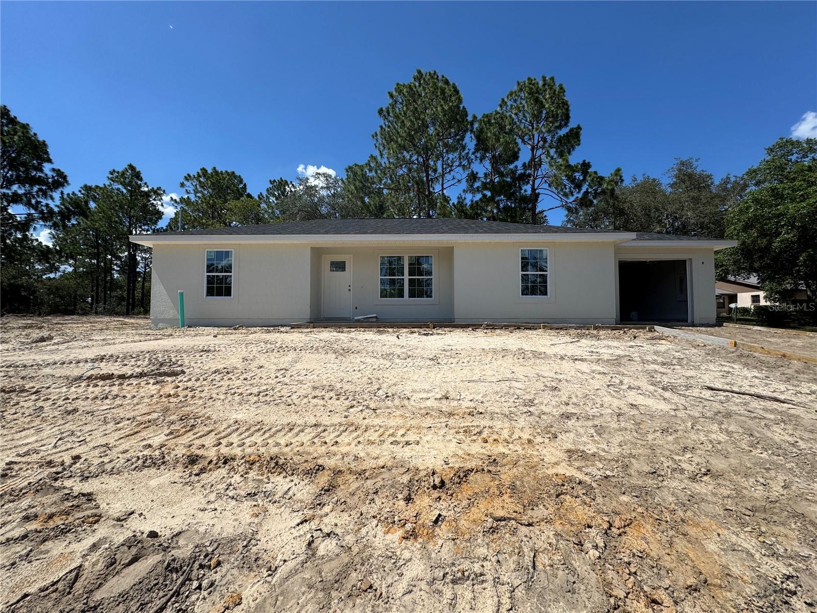 Under Construction. Brand new spacious Stucco exterior frame home at an affordable price! Split plan three bedroom / two bathroom with attached finished one car garage that is equipped with a garage door opener. The kitchen offers Granite counter tops with upgraded cabinets. Stainless steel appliance package which includes the range, microwave, dishwasher and refrigerator. Tile in the bathrooms, Ceiling fans and more. Great location to shopping, activities, medical facilities and restaurants.