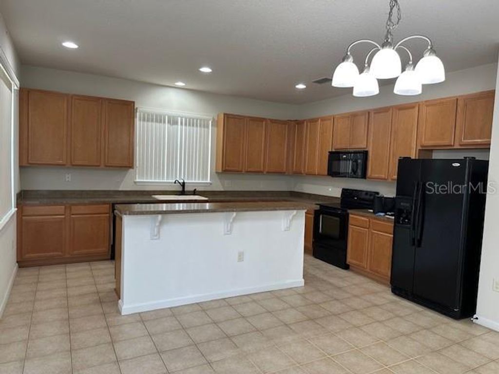 Photo of 236 Bayberry Lakes Boulevard, Daytona Beach, FL 32124 (MLS # O6356896)