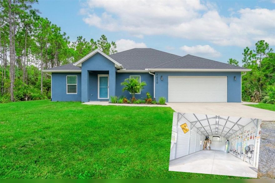 Built in 2021 and tucked away on a paved road in Indian River Park, this 4-bedroom, 2-bath property delivers the hard-to-find combination buyers want: modern construction, usable land, and serious garage space. Set on just under an acre and surrounded by mature pines, you’ll enjoy privacy without sacrificing convenience.  Inside, the home is bright, open, and move-in ready. The kitchen is designed to impress with 36” white shaker cabinetry, quartz countertops, a breakfast bar, Bertazzoni electric range with hood, stainless 4-door refrigerator, and luxury vinyl plank flooring throughout the main living areas. French doors lead to the trussed back porch, giving you an easy indoor-outdoor flow for relaxing evenings or weekend get-togethers.  A split floor plan provides privacy, with a spacious primary suite featuring dual sinks, a walk-in tiled shower with glass enclosure, a large walk-in closet, and private water closet. Guest bedrooms are well sized, and the secondary bath offers a tub/shower combo. You’ll also find a formal dining area plus an interior laundry room with sink and extra storage.  Now for the showstopper: the detached 35’ x 20’ enclosed workshop with an attached 25’ x 10’ carport and its own 60-amp electrical panel. Whether you’ve got boats, RVs, projects, tools, or toys, there’s room for all of it, with space left over to expand, garden, or park more equipment.  Concrete block construction, vaulted ceilings, rain gutters, and a tankless water heater add even more value.  Enjoy the quiet feel of country living while being just minutes from US-1, the Space Coast, shopping, dining, and major routes.  If you’ve been waiting for newer construction with land and a real shop, this is it.  All information is intended to be accurate, but is not a hundred percent guaranteed.