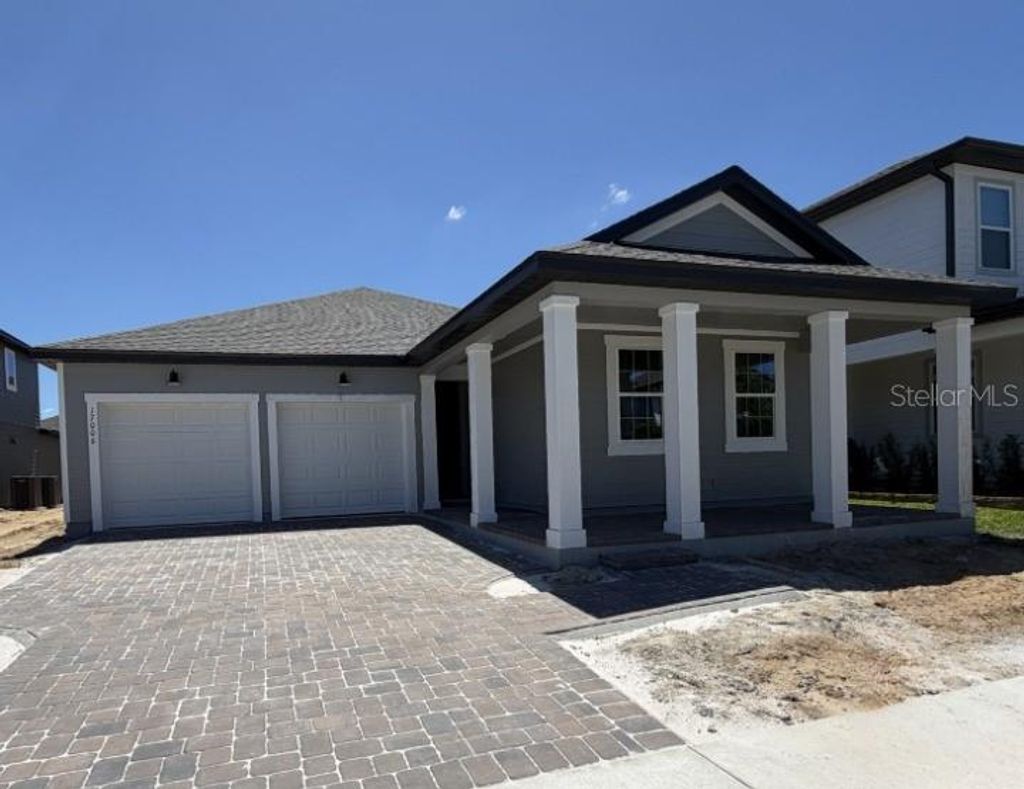 Photo of 17006 Seville Orange Road, Winter Garden, FL 34787 (MLS # TB8493597)