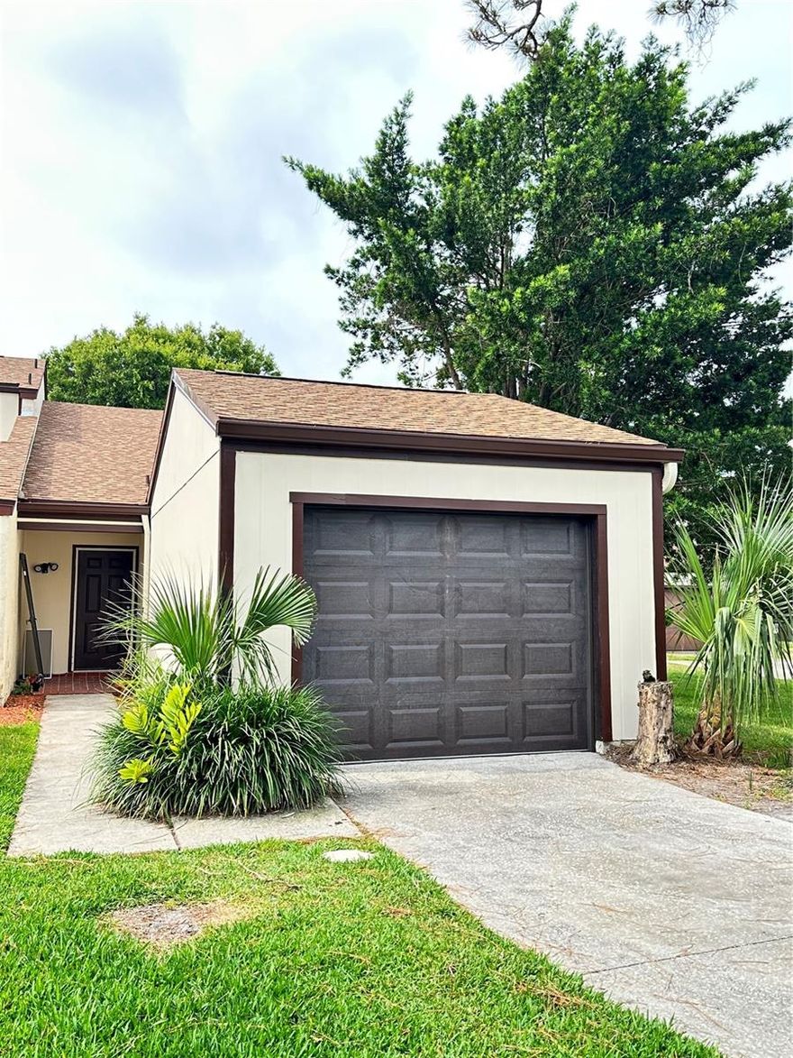 One or more photo(s) has been virtually staged. Fully renovated townhouse located in Rockledge. This property offers two bedrooms, two full bathrooms, and a one-car garage, it has been extensively updated to ensure it is move-in ready. The interior of the home has been completely refreshed with new vinyl flooring, baseboards, interior doors, and a fresh coat of paint throughout. The kitchen features new white cabinetry, stainless steel Frigidaire appliances, and a farmhouse sink. Similarly, the bathrooms have been upgraded with new vanities, shower inserts, fixtures, lighting, and commodes. Additional interior improvements include new windows and new ceiling fan in the living area. The exterior has also been well-maintained, featuring a new roof, gutters, and fresh exterior paint. For outdoor enjoyment, the back porch includes a new screen enclosure with updated indoor/outdoor flooring. Additionally, the air conditioning system was recently serviced to ensure optimal performance.