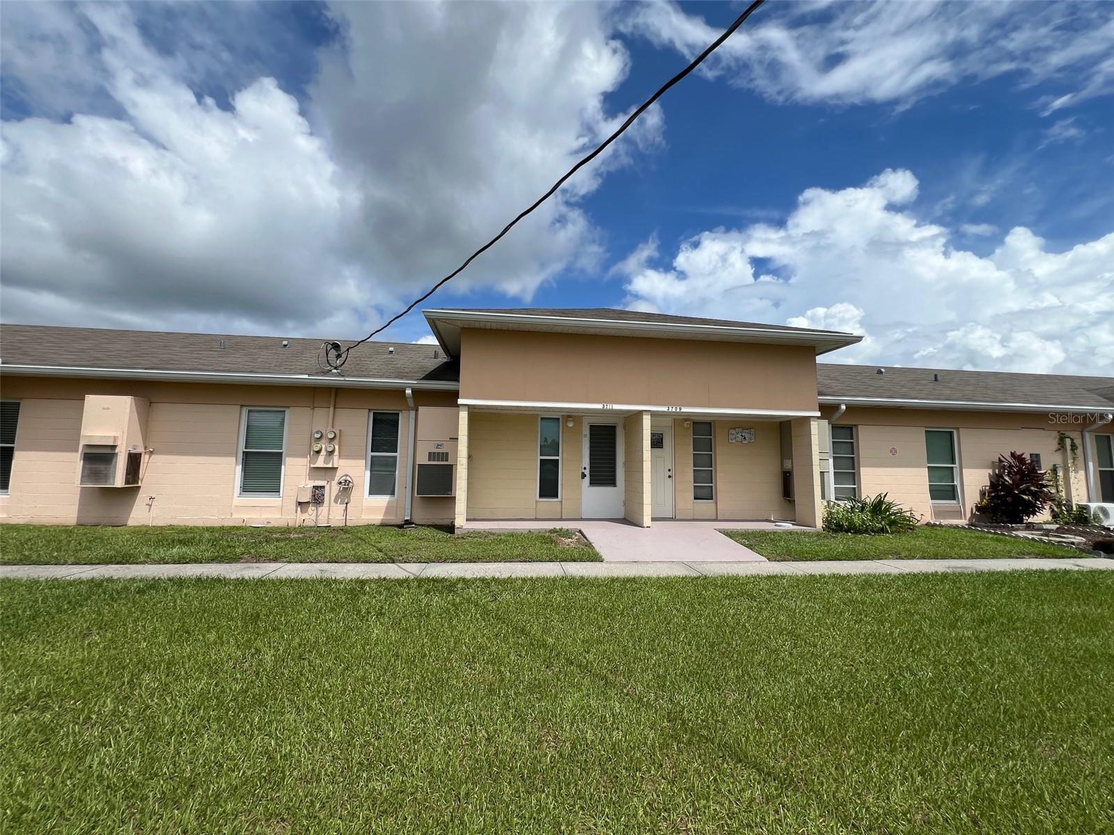 Welcome to Lakeshore Club Villas - a vibrant, all-ages community in Lake Wales! The open floor plan has a combined dining and living area with sliders that lead out to a lanai area that can provide extra living space. Off of the lanai is a covered patio where you can sit and enjoy the beautiful water view! The bedroom is a gracious size and a stackable washer and dryer is conveniently tucked inside the closet. The bathroom has been updated with pretty designer-look tile. The kitchen has been updated with warm-colored wood cabinets...so pretty! Easy care ceramic tile runs throughout and the high-beamed ceiling in the living and dining room adds a ton of volume space and gives the space an airy feeling. Surrounded by natural beauty and located just minutes from downtown, shopping, dining, healthcare, Hwy 27, and the Florida Turnpike. Low HOA Fee – Only $290/month – Includes: Water, sewer, trash, exterior maintenance and landscaping, Spectrum TV and high-speed internet (modem/router included), Building insurance, Pool maintenance and 24/7 community security, full access to community amenities. Community Highlights: Resort-style pool, spa, and jacuzzi, Clubhouse with daily activities and event rooms, Mini-golf, shuffleboard, horseshoes, game room, Tennis, racquetball, bocce, basketball courts, lighted Walking trails, nature paths, fishing piers, and recreational island, Marina access and boat slips on Lake Walk-In-Water (7,500-acre premier bass lake). The town square has an On-site chapel, post office, library, thrift store, salon, laundry, car wash and more! Ideal for year-round living or as a vacation home. Don’t miss this opportunity to enjoy a maintenance-free lifestyle in a highly sought-after community! Schedule your private tour today!