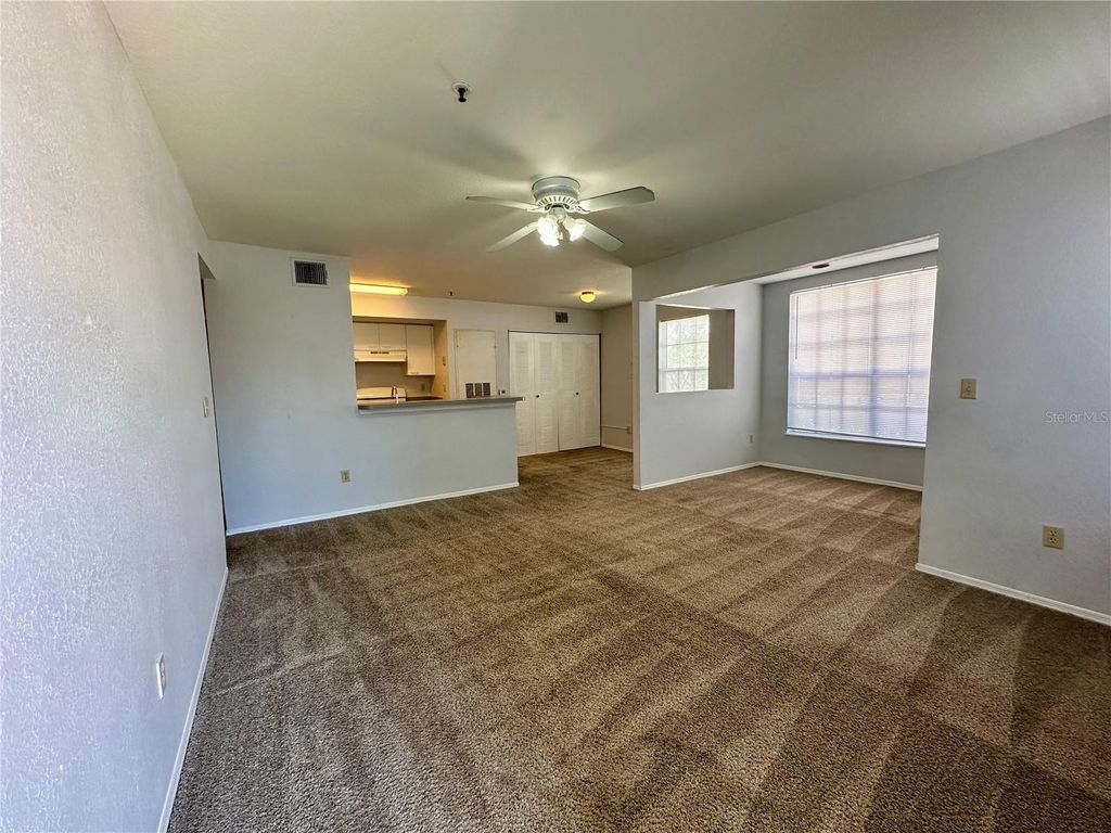 Photo of 1610 Columbia Arms Circle #131, Kissimmee, FL 34741 (MLS # O6401044)