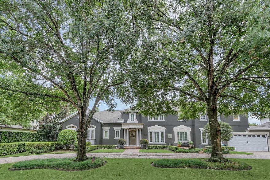 This gracious estate is situated on a pristine 1/2 acre private lot just minutes to Park Avenue’s upscale boutiques & restaurants. As you enter this exquisite home you notice the light & bright open floor plan perfect for family living & entertaining. The fabulous chef’s kitchen has beautiful custom cabinets, Sile stone countertops, Thermador appliances including a 48” gas cooktop w/ pot filler, refrigerator, double ovens, microwave, 2 dishwashers & a large center island w/ prep sink. The expansive Great Room has a fireplace & French Doors . The Family Room is open to the kitchen w/ a cozy fireplace & French doors. There is a private office-den & fabulous walk-in temperature controlled wine room. The floor plan has 2 dining areas . The downstairs guest suite would be ideal for elderly parents or a 2nd master. Upstairs the exquisite & spacious Owners' Suite was recently renovated w/ 2 walk-in closets. Owners' spa bath has dual sinks, a soaking tub & large separate shower. There are 2 additional bedroom en suites upstairs & a laundry room.  As you walk outside expect to be impressed by the spacious private park-like setting w/ masonry wall, classic open pool w/ firepit & fountains, a large screened & covered lanai & a sport court w/ reg. basketball.  Add'l features:  New: Roof, Windows, AC, Master Suite, Generator, electric charging station, ext. paint & flooring.