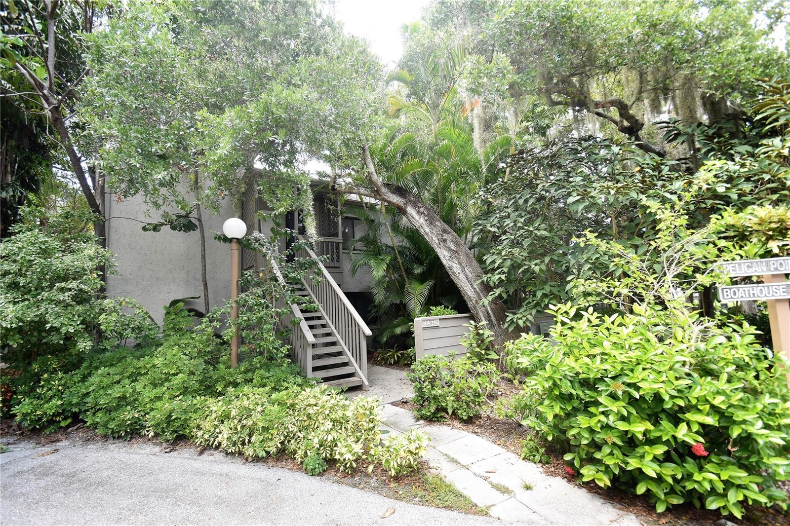 ***AVAILABLE NOVEMBER 20, 2025*** Discover the allure of coastal living in this enchanting 2-bedroom, 2-bath plus den / third bedroom. Boasting stunning intercoastal water views from your covered lanai, this property offers a serene, treehouse-like experience surrounded by lush landscaping. Inside, enjoy the spaciousness and elegance of cathedral ceilings that enhance the open, airy feel of the home. This unique residence combines comfort with natural beauty for an unparalleled living experience. Pelican Cove is one of Sarasota's most popular gated, waterfront complexes. This paradise is found amid 75 acres of landscaped grounds with miles of scenic walking trails and paths, four lighted tennis courts, three clubhouses, an 87-boat slip marina, Pickleball and its own "Pelican Cove University" offering a wide range of courses and many recreational clubs. Special events are featured monthly in the Pelican Cove Newsletter and website. Owners also enjoy the complex's bird sanctuary, botanical gardens, fishing pier, saltwater creek and spectacular coastal views.