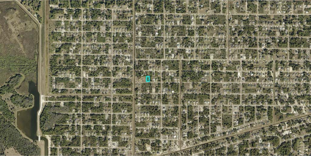 Photo of 3008 40th Street W, Lehigh Acres, FL 33971 (MLS # A4698858)